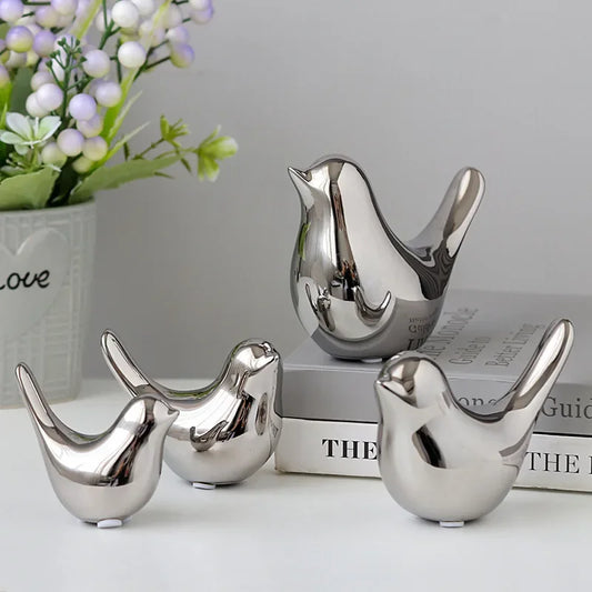 Silver Bird Figurines