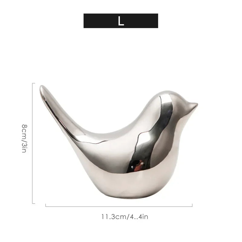 Silver Bird Figurines