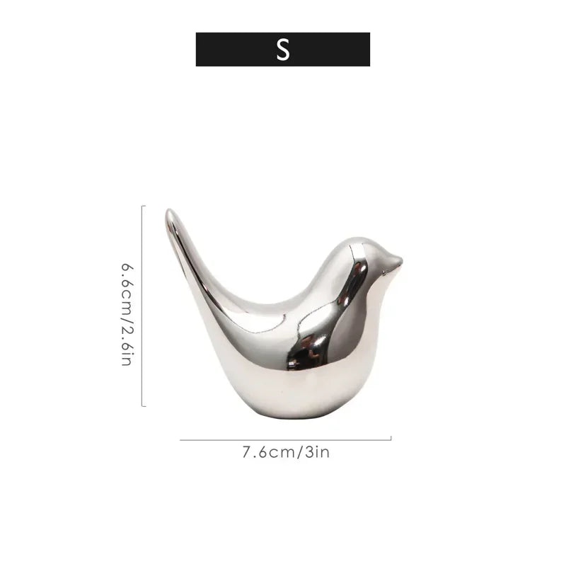 Silver Bird Figurines