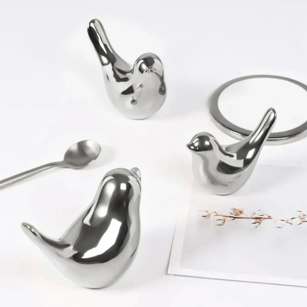 Silver Bird Figurines