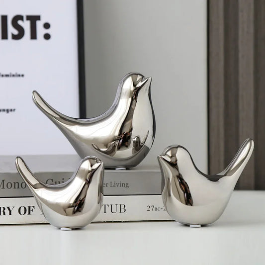Silver Bird Figurines