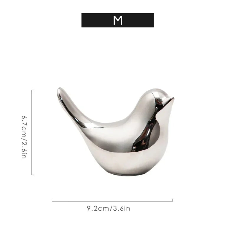 Silver Bird Figurines